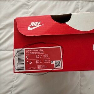 Size 6 womens peach cream dunks, never worn